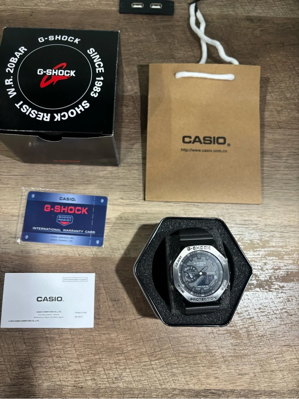 Casio G-Shock Black and Silver Resin Watch with Tin Case